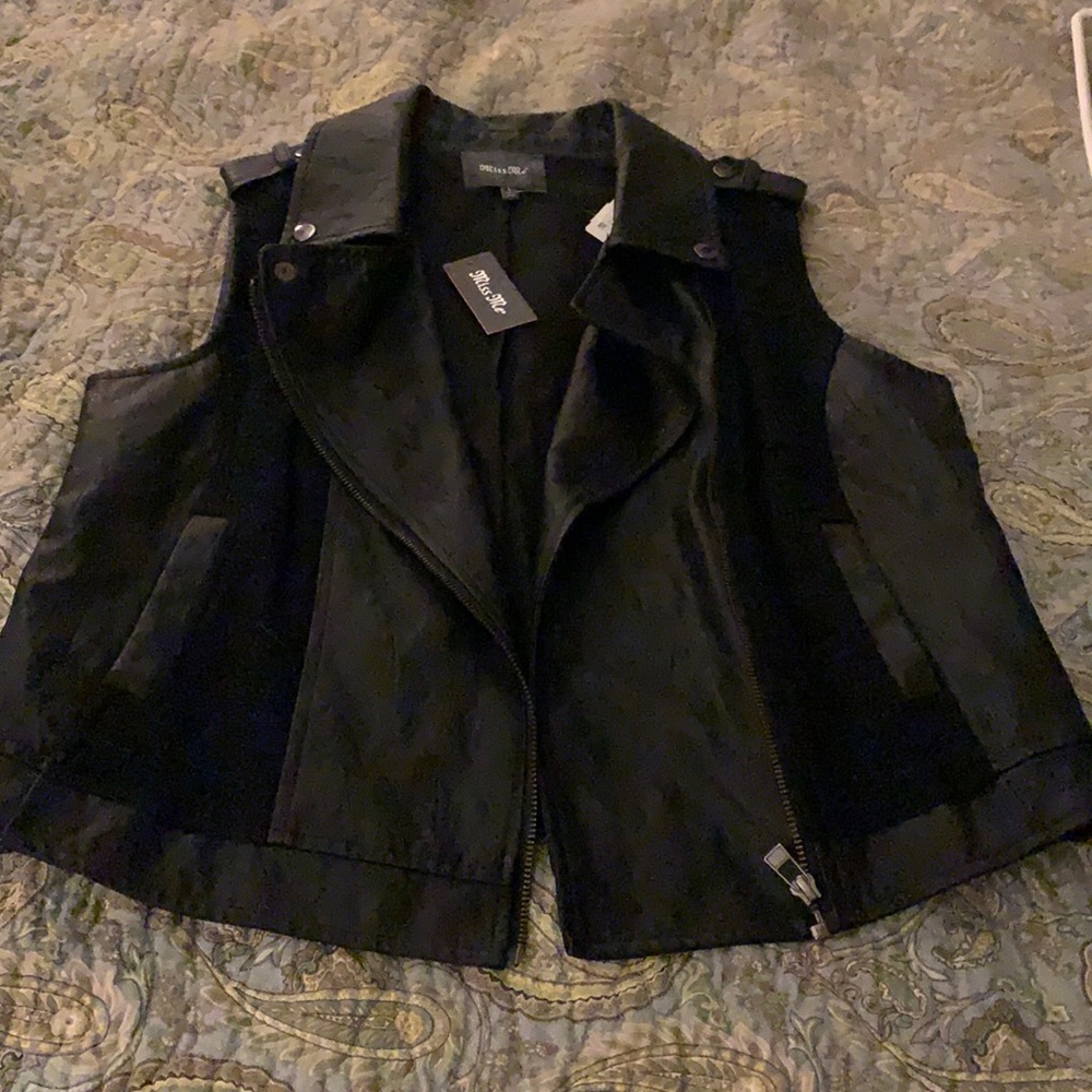 Miss Me vest, leather material. Size large